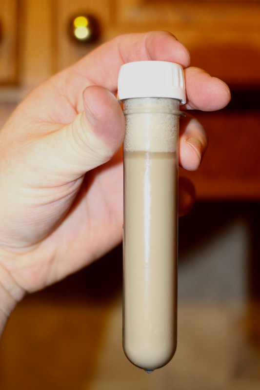 a vial containing yeast solution
