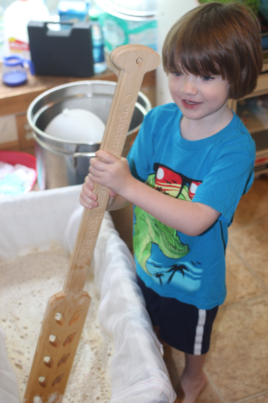 Silas helping to stir